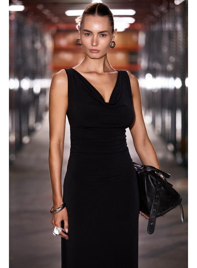 GRIMELANGE ANYA Women's Soft Flexible Fabric Body-Fitting Dress with Pleated Details and Degage Neckline in Black. - Image 2