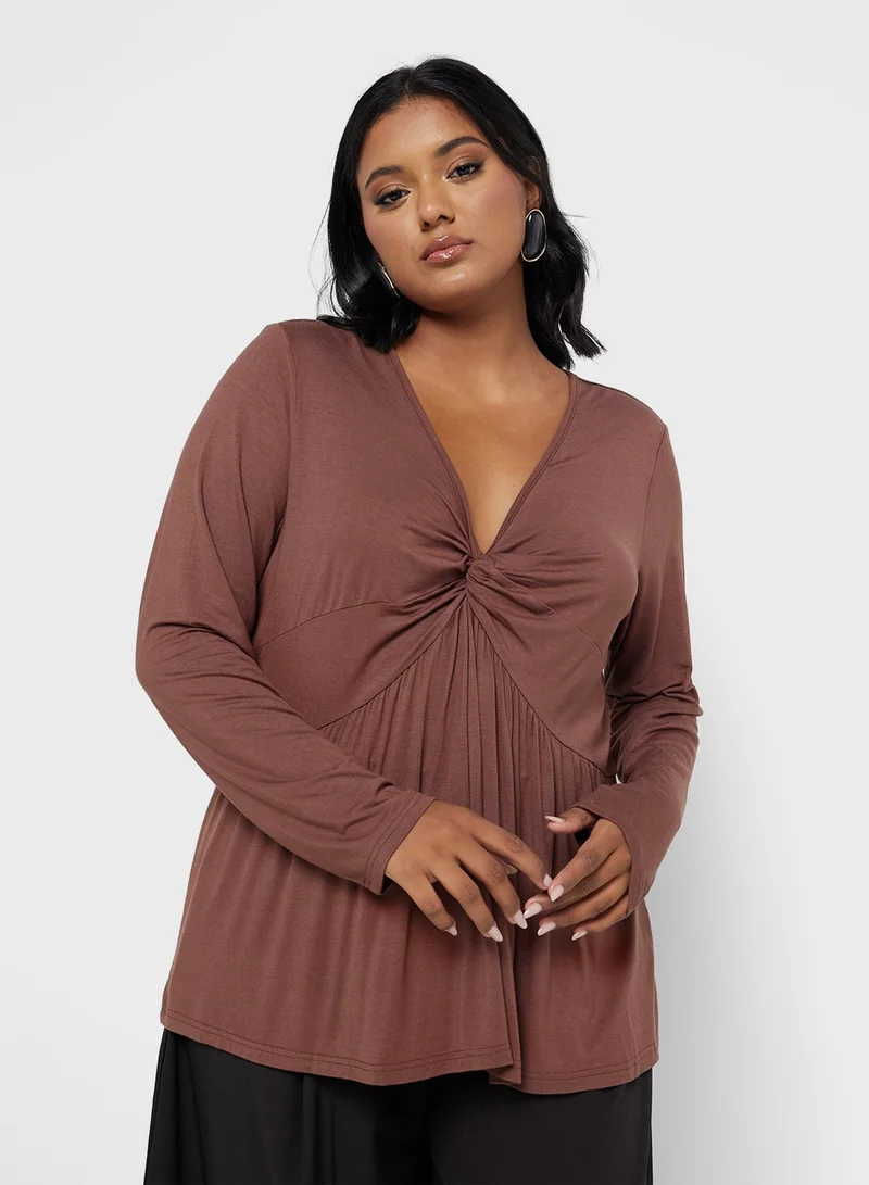جينجر بلس بلوزة تونيك بأكمام طويلة وياقة على شكل حرف