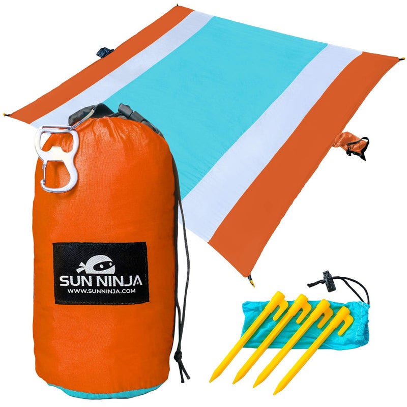 SUN NINJA Sand Proof Beach Blanket - Sand Free Beach Mat, Lightweight & Quick Dry Beach Essentials with Travel Bag, Giant Beach Blanket (10'x9') Perfect for Outdoors, Picnic, Camping & Travel - Image 1