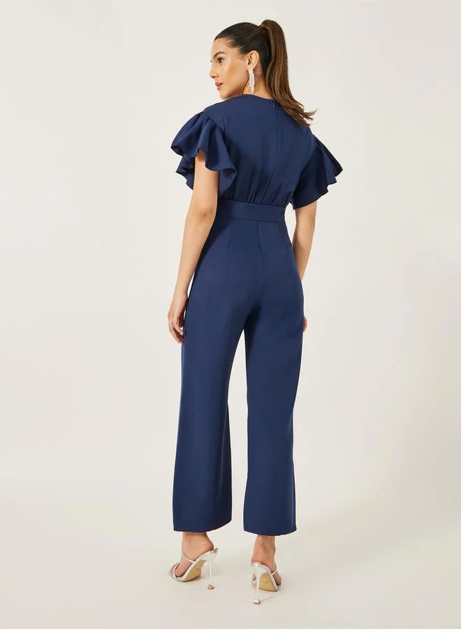 Styli Flutter Sleeve Round Neck Belted Jumpsuit