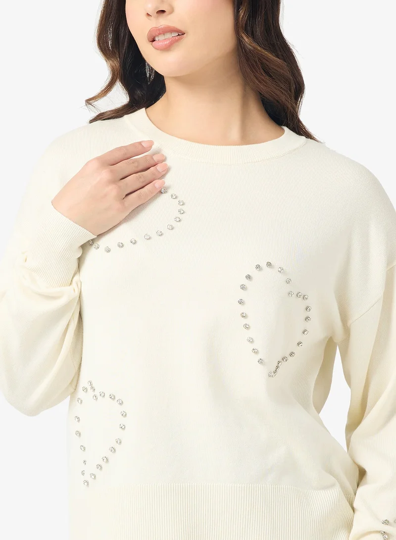 اونلي بلوزة أونلبي بأكمام طويلة وياقة دائرية بتصميم قلب