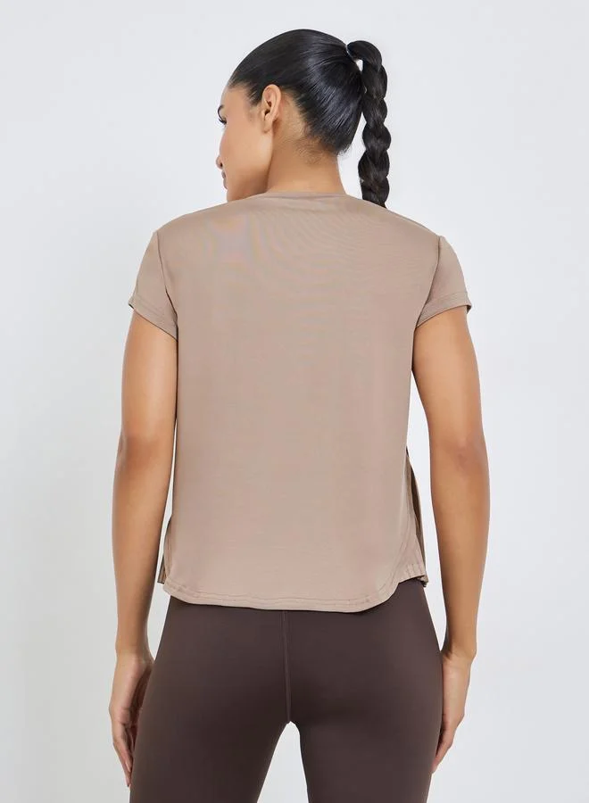 Styli Active  Beige Short Sleeve Top with Pleated Hem for Women | Best Price UAE