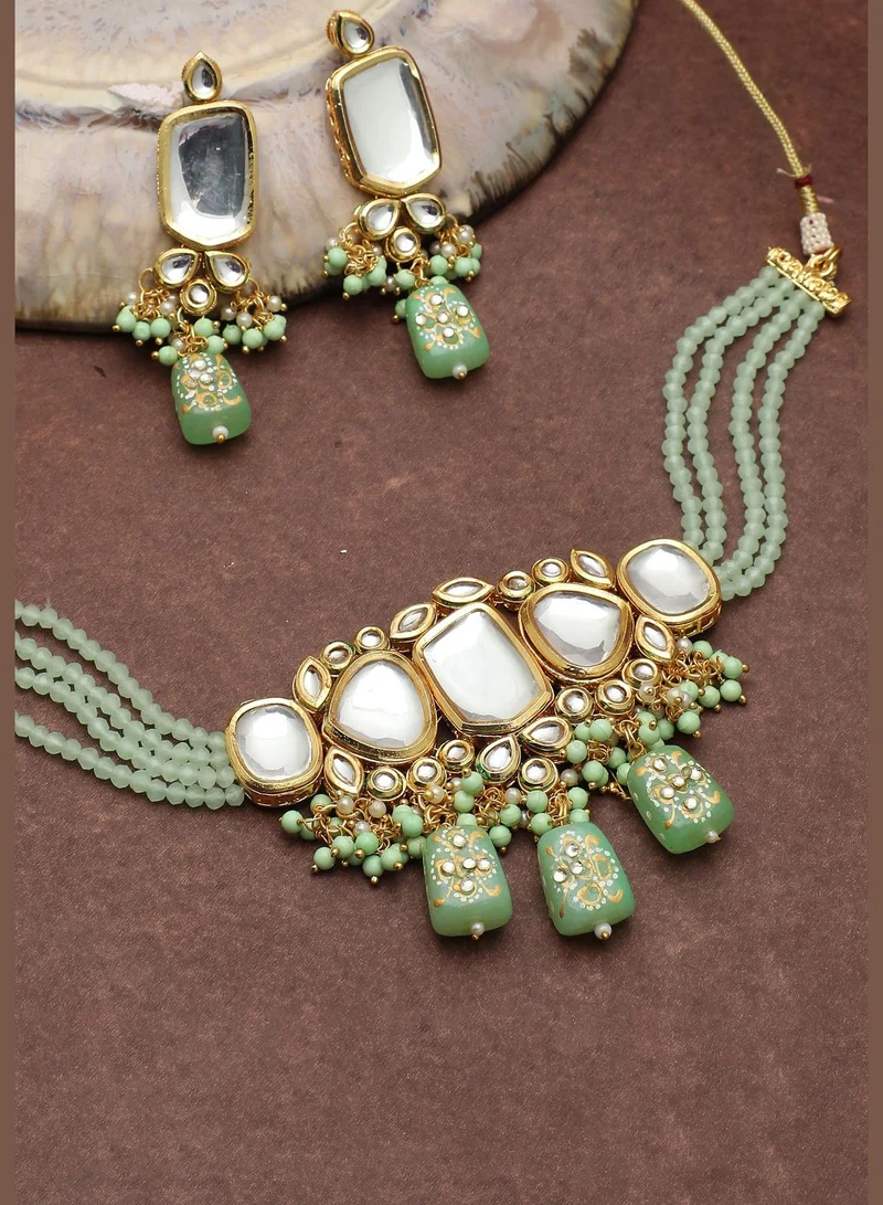 SOHI Gold Plated Kundan Beads Necklace and Earring Set