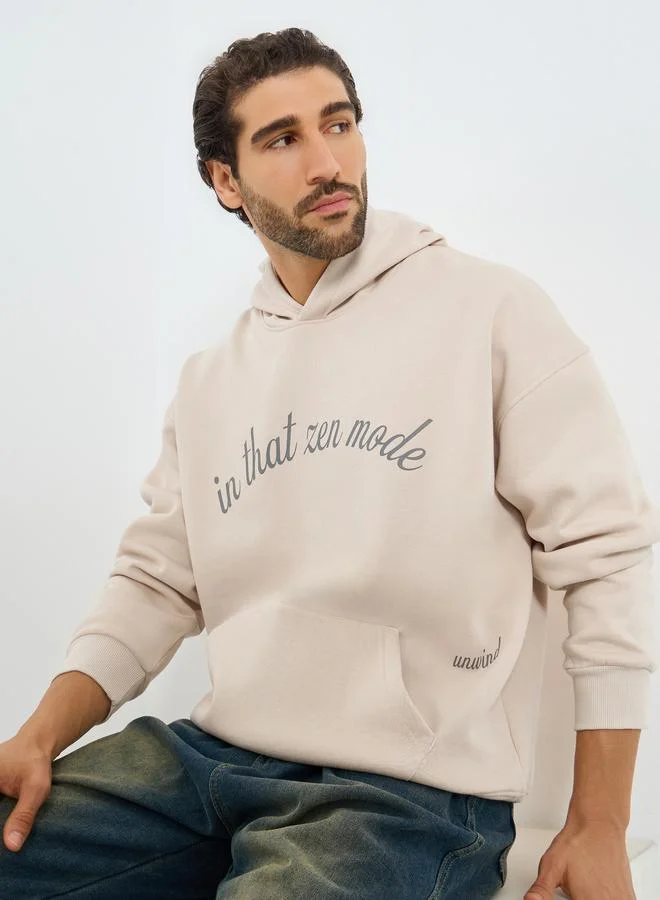 Styli Men Beige Oversized Zen Mode Print Fleece Hoodie