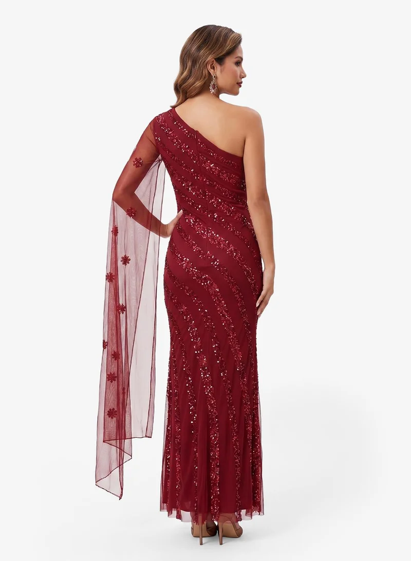 Namshi x One Shoulder Bead Embellished Evening Gown with Cape Sleeve