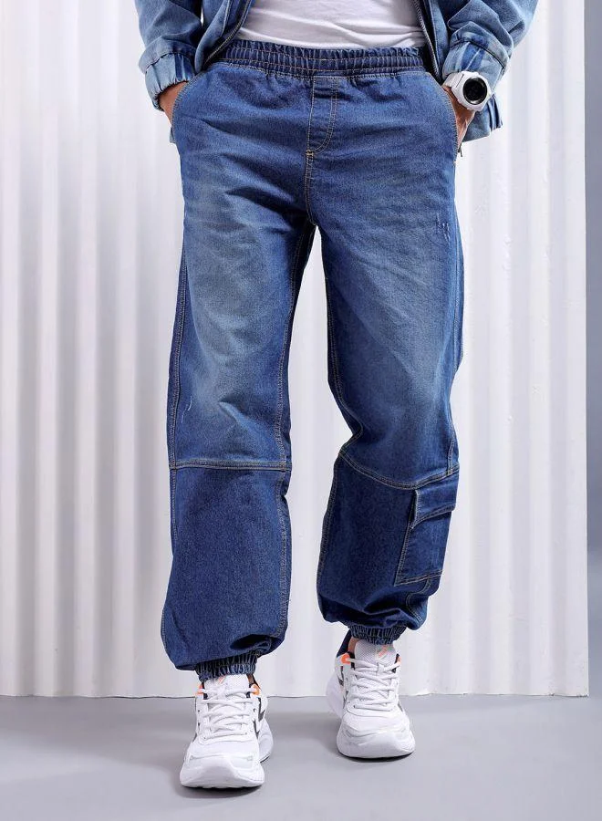 Men Loose Fit Solid Mid-Rise Stretchable Denim Joggers