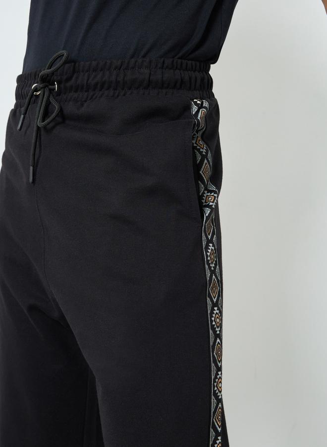 Styli Men Black Oversized Terry Printed Panel Joggers - Image 4