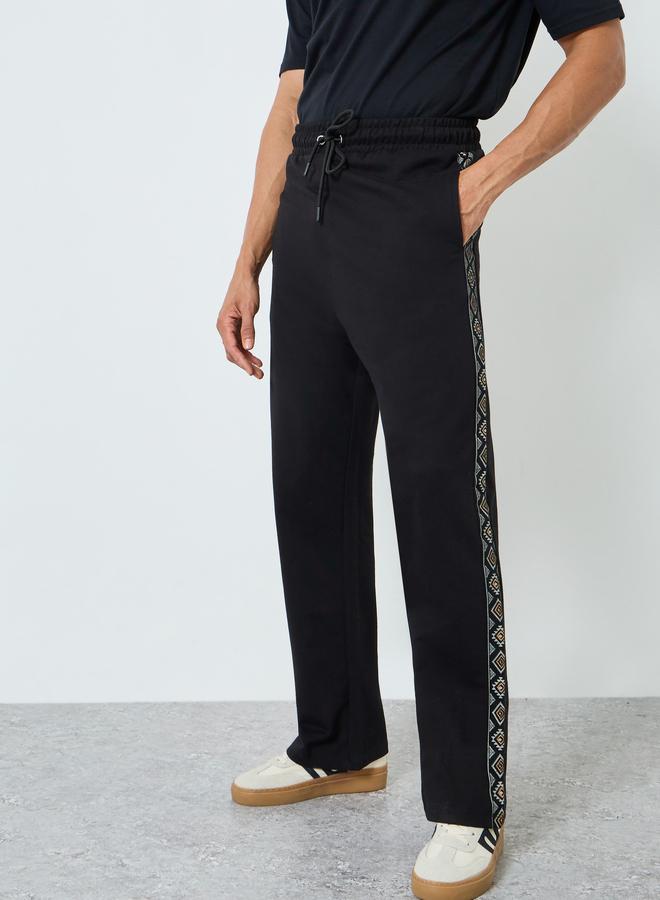 Styli Men Black Oversized Terry Printed Panel Joggers - Image 3