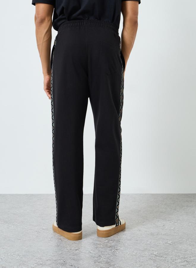 Styli Men Black Oversized Terry Printed Panel Joggers - Image 5