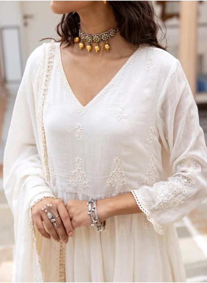ISHIN Festive Women Off White Cotton Kurta Set with Embroidered pattern Tunic and Palazzo features a Round neckline and Three-Fourth Sleeve secured with Elastic closure and styled in Straight Fit ideal for Festive moments — perfect for fashion-forward occasions.
