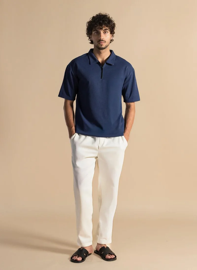 SHAPES DETAILED ZIP POLO SHIRT