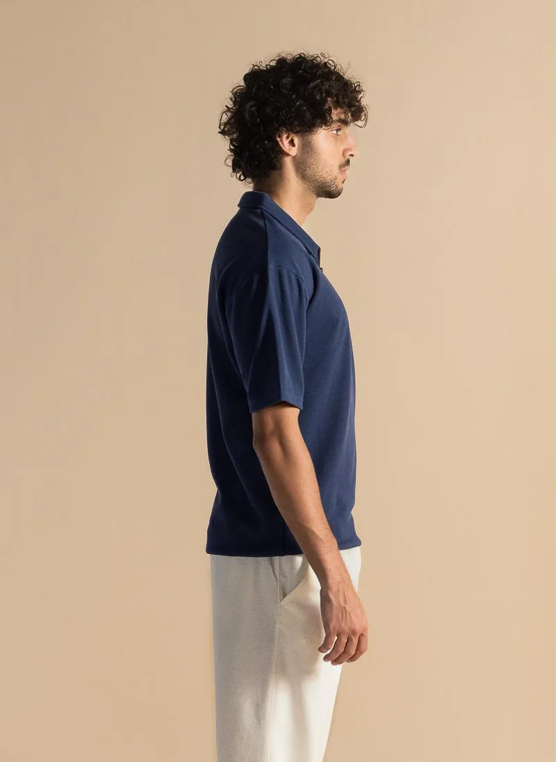 SHAPES DETAILED ZIP POLO SHIRT