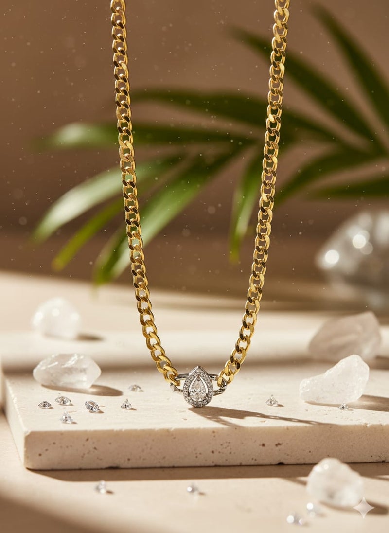 A wide gold-plated chain necklace featuring a teardrop or pear-shaped pendant. It shines in a shiny silver finish and comes with additional links for adjusting the size. - Image 4
