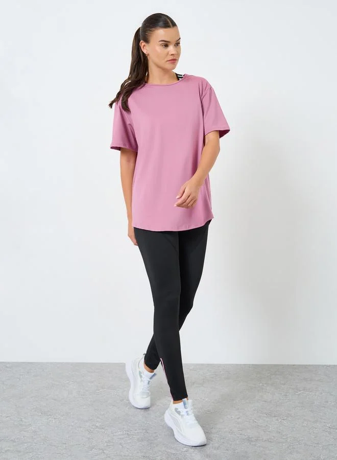 Styli Active Pack of 3 - Mesh Panel T-Shirt, Crossback Strap Sports Bra and Stitch Detail Leggings