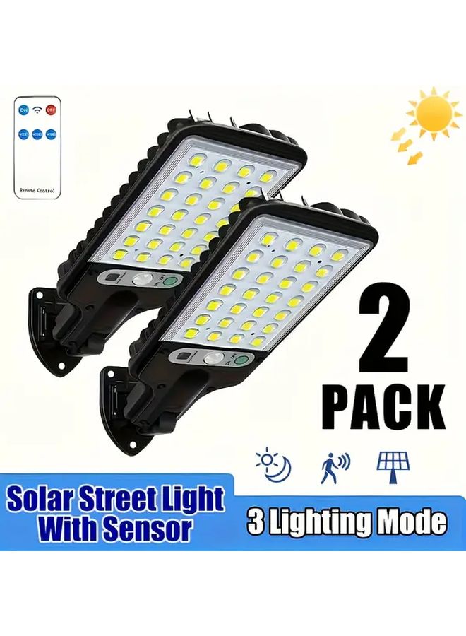 2pcs Smart Solar Light Outdoor Motion Sensor 3 Modes Remote Control For Garden Garage - Image 1