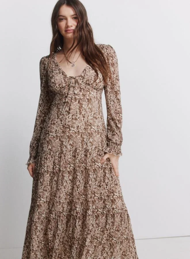 Springfield Printed long sleeve V-neck midi dress