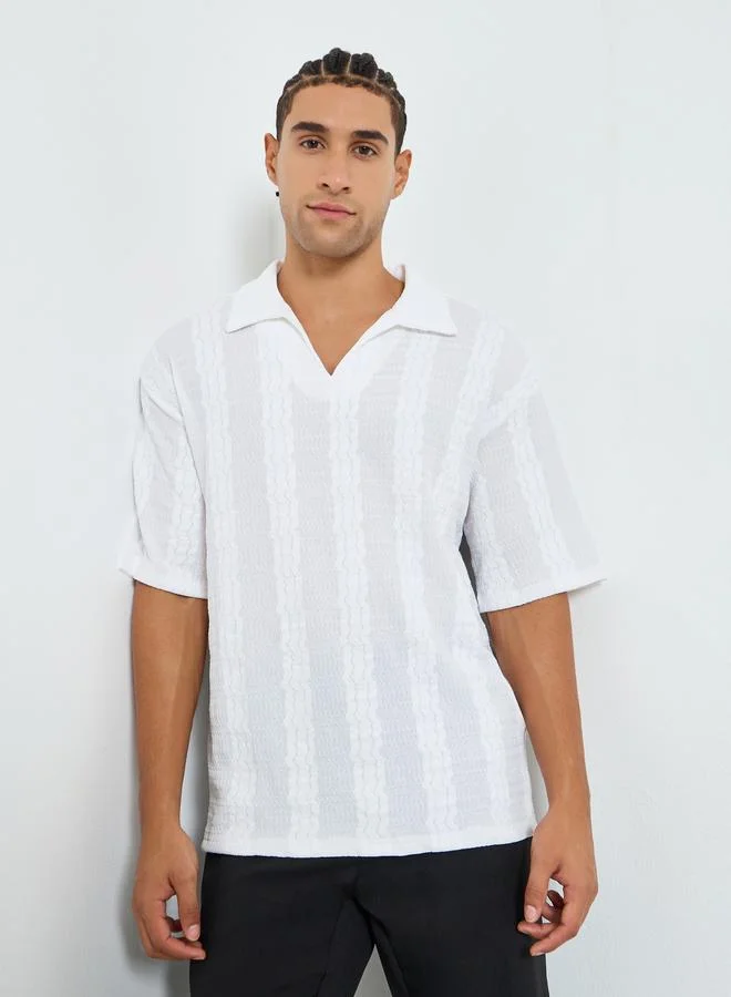 Men Textured Woven Relaxed Polo with Open Collar