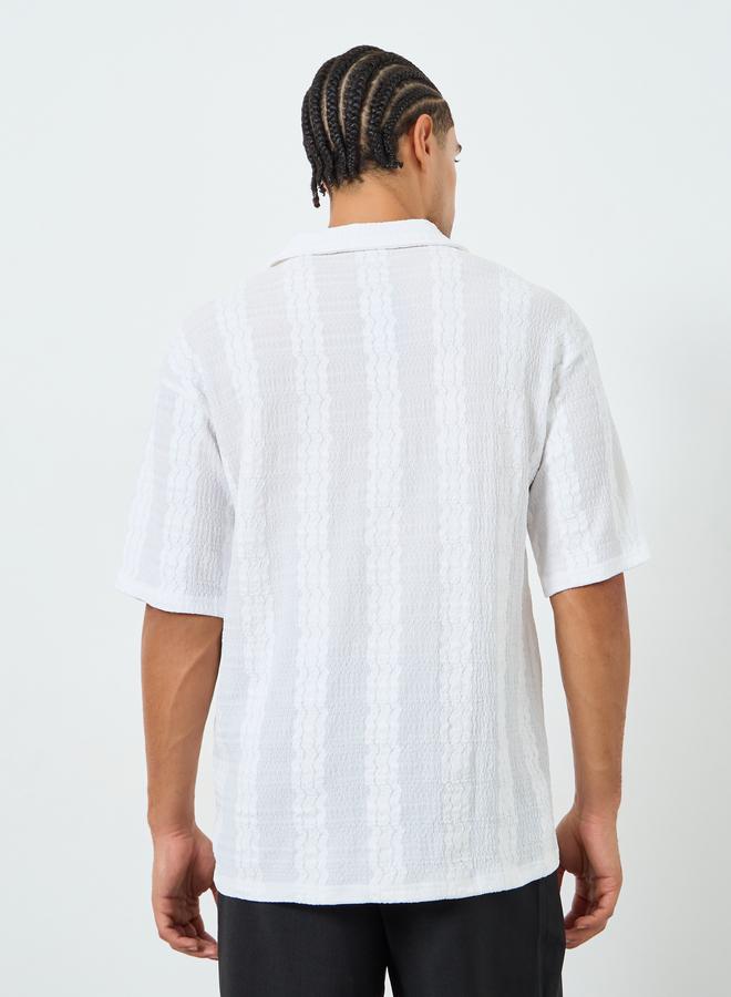 ستايلي بولو منسوج بقصة مريحة وياقة مفتوحة - Image 4