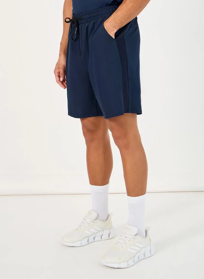 Styli Solid Stretchable Woven Shorts with Drawstring Detail