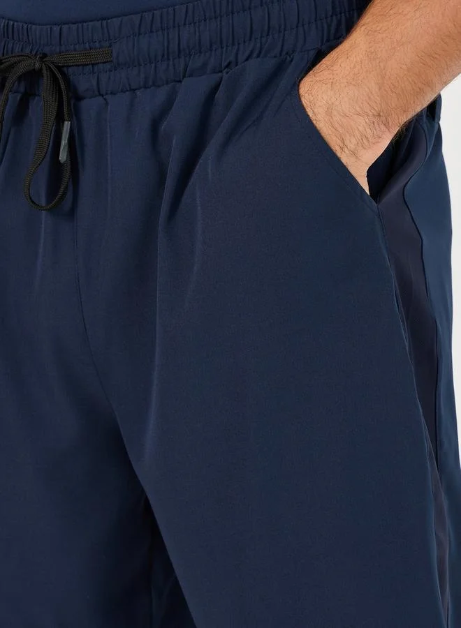 Styli Solid Stretchable Woven Shorts with Drawstring Detail
