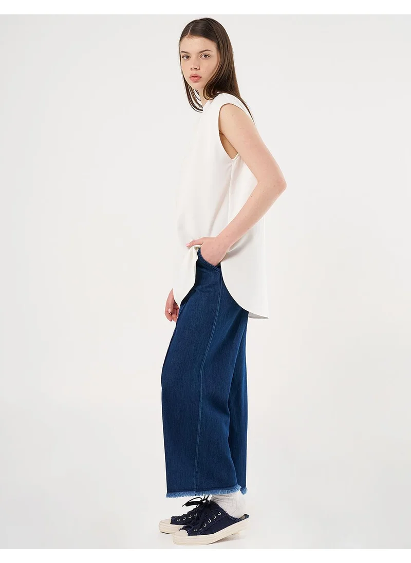 Kayra Sleeveless T-Shirt in Ecru