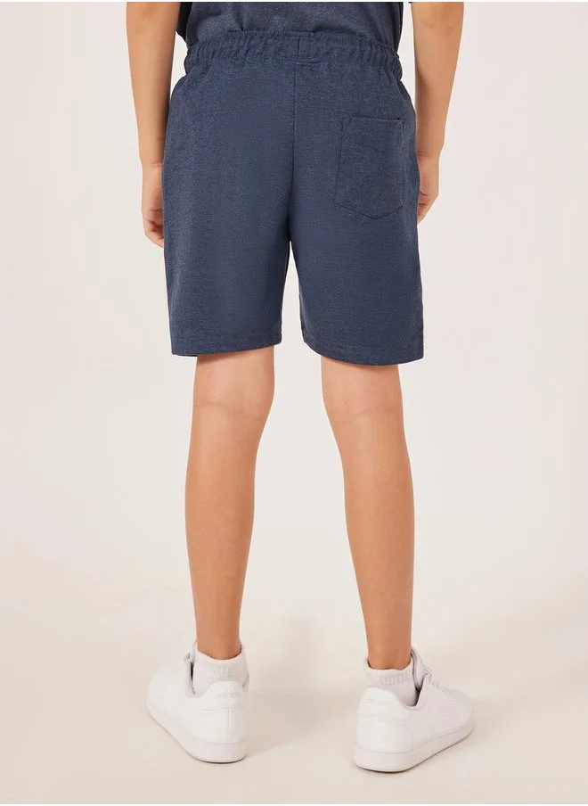 ستايلي Solid Drawstring Waist Shorts with Badge Detail