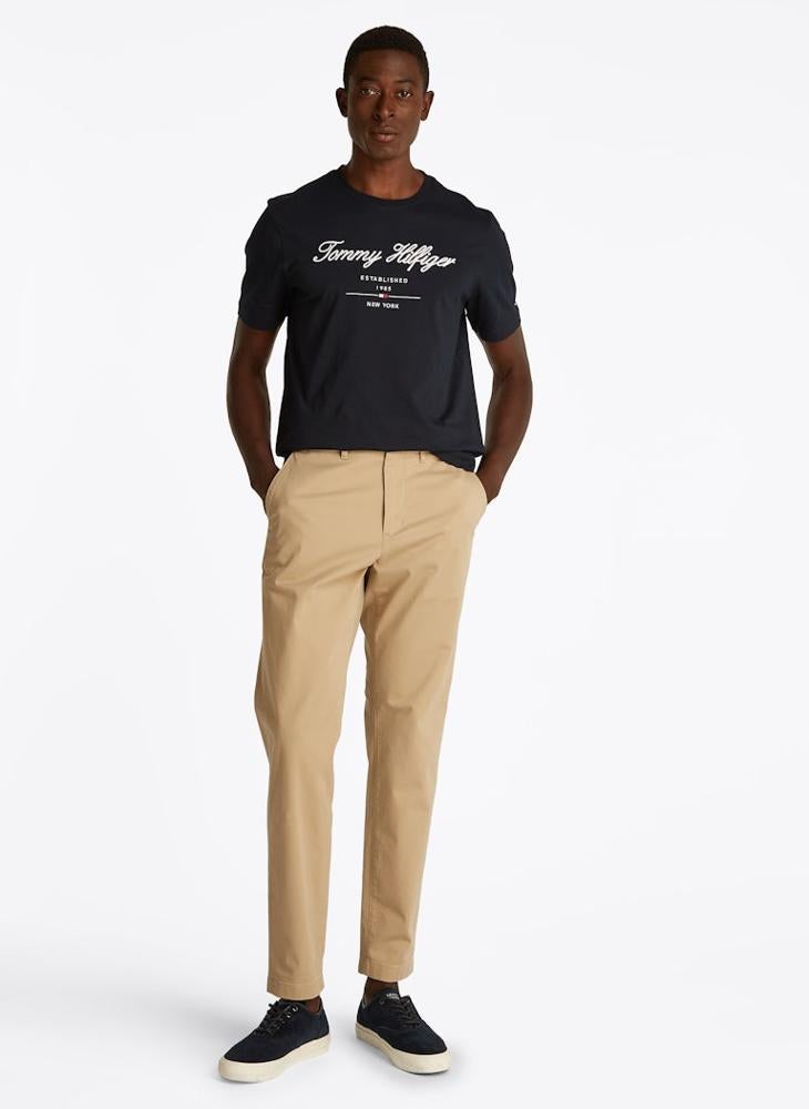 TOMMY HILFIGER - Harlem Tapered Stretch Chino Trousers - Image 1