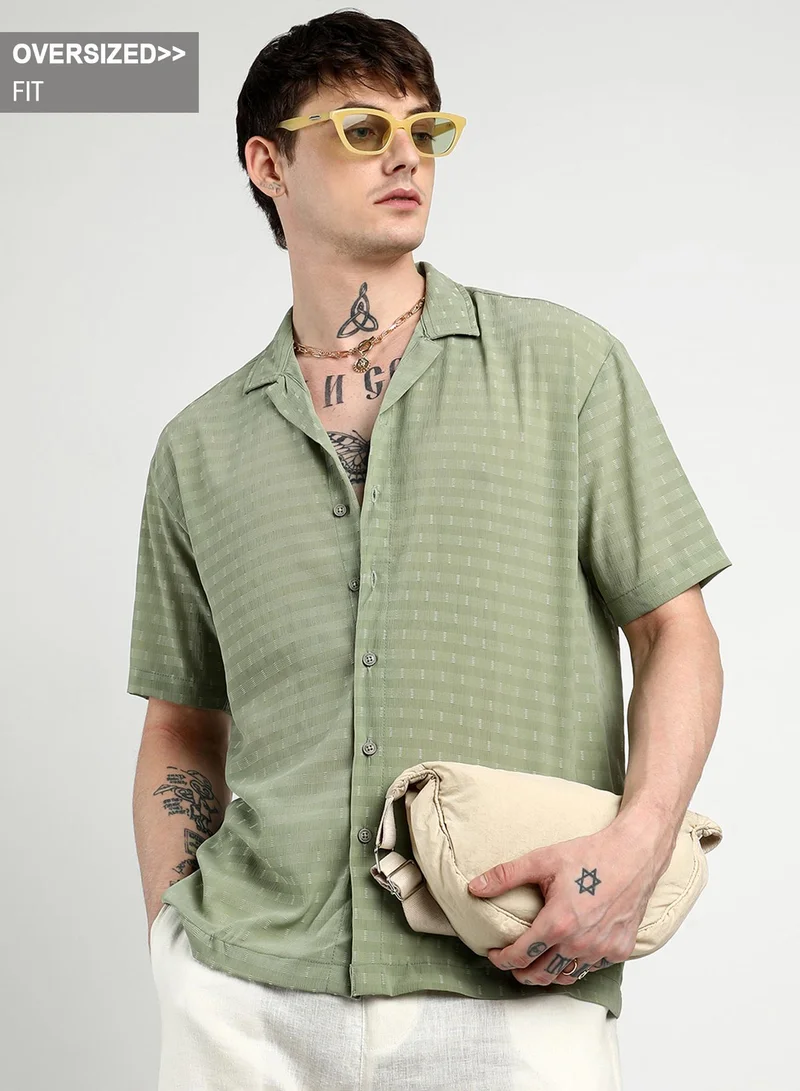 Campus Sutra Campus Sutra Men's Pistachio Green Oversized Woven Shirt For Casual Wear | Cuban Collar | Short Sleeve | Button Closure | Shirt Crafted With Comfort Fit For Everyday Wear