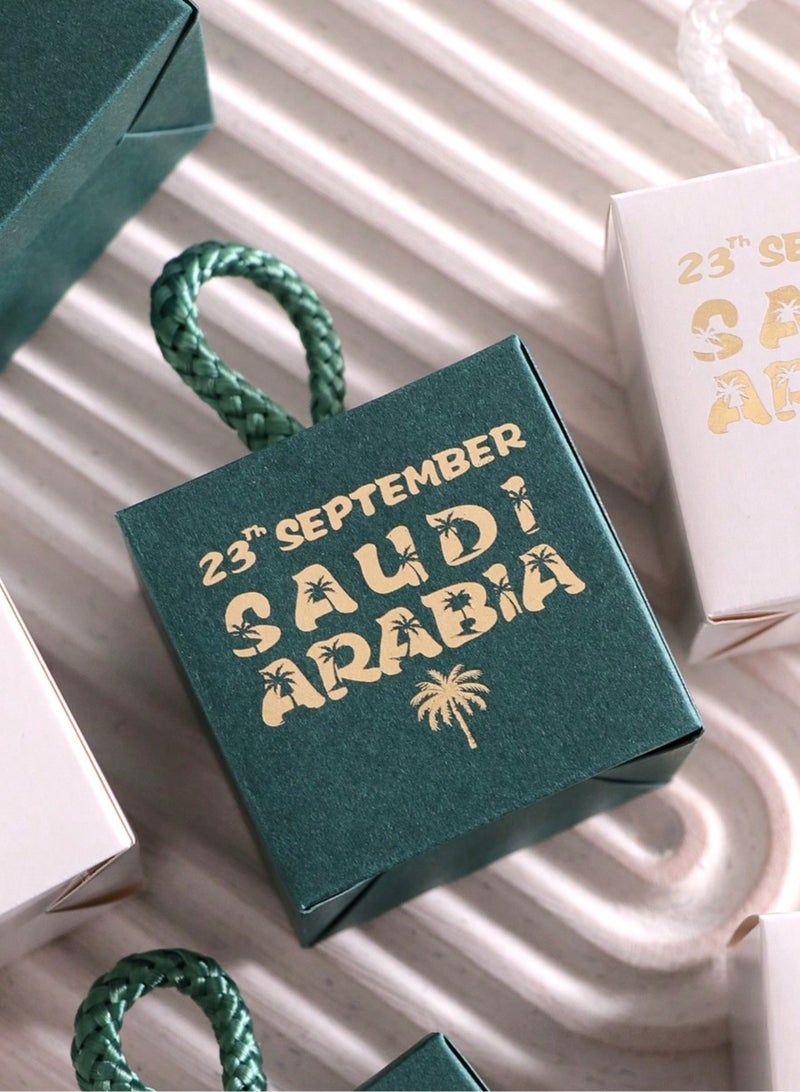 Saudi National Day Decorations 5 small green boxes with a twisted fabric ribbon printed with the date of the National Day for giving gifts and distributions during National Day celebrations - Image 3