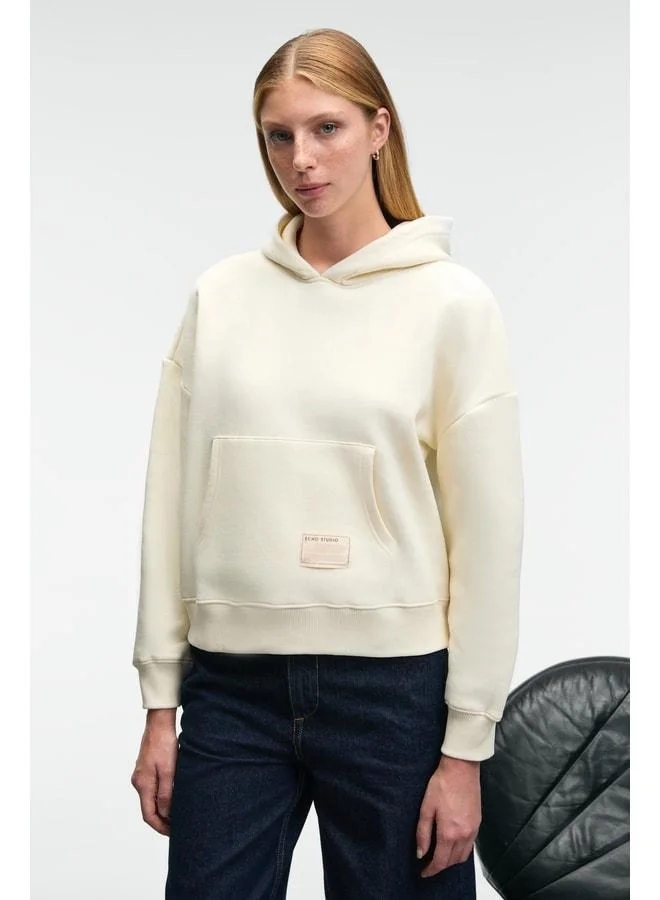 GRIMELANGE CLARIE Women's Organic Cotton Oversized Kangaroo Pocket Hooded Beige Sweatshirt.