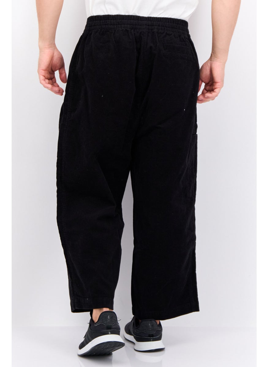 PUMA Men Sportswear Fit Brand Logo Outdoor Sweatpants, Black  - Image 2