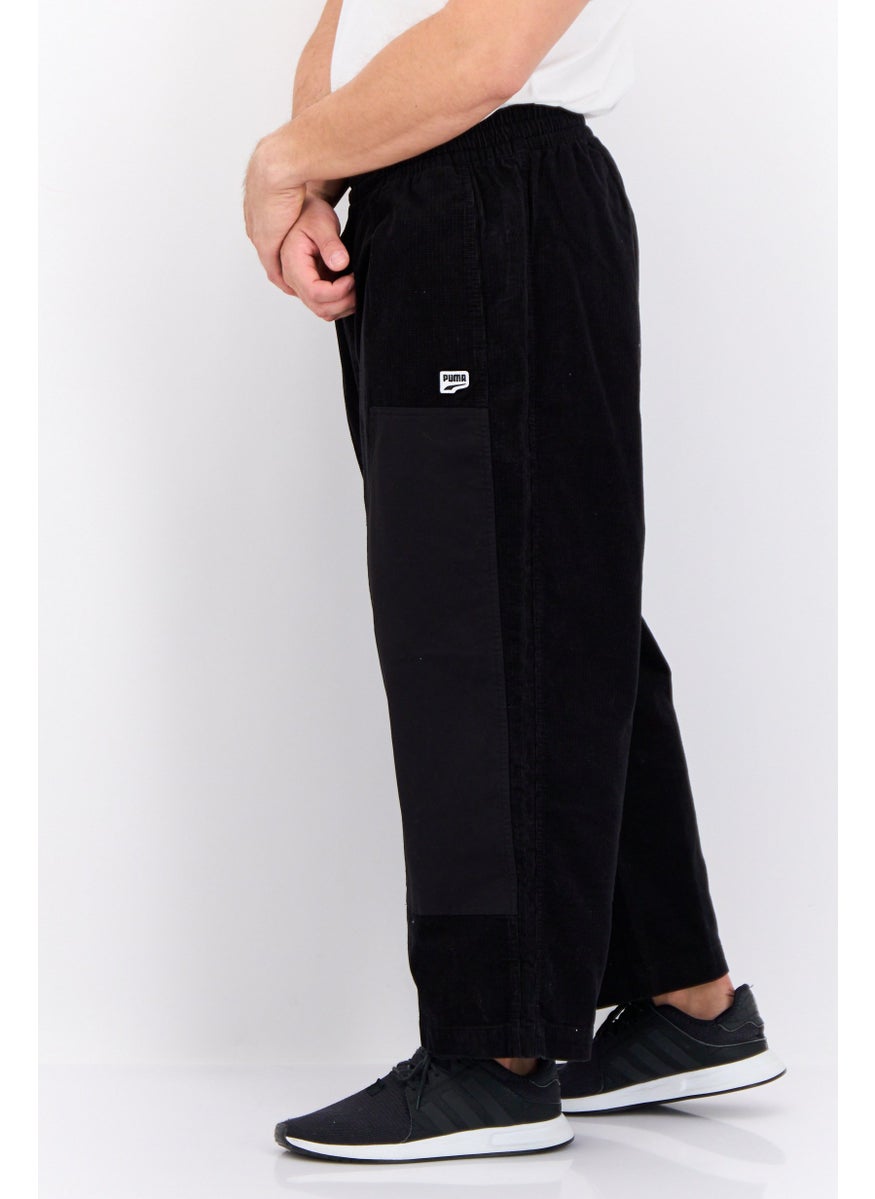 PUMA Men Sportswear Fit Brand Logo Outdoor Sweatpants, Black  - Image 3