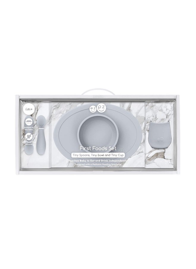 ezpz ezpz First Food Set - 100% Food Grade Silicone Suction Bowl with Built-in Placemat, Training Cup & Spoon - Designed by a Pediatric Feeding Specialist - Promotes Self Feeding - 6 Months+ (Pewter)  - Image 1