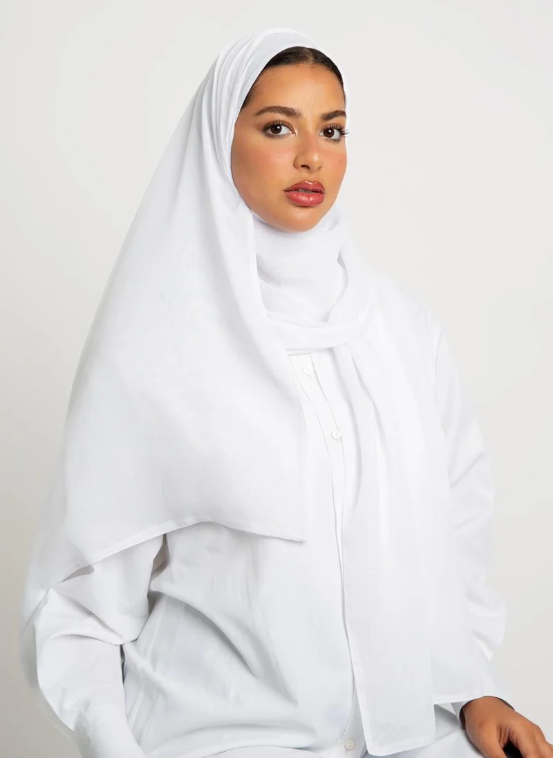 كاف ميم طرحه بوال أبيض
