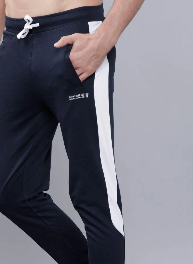 The Indian Garage Co Men Slim Fit Solid Mid-Rise Stretchable Knitted Jogger Trousers