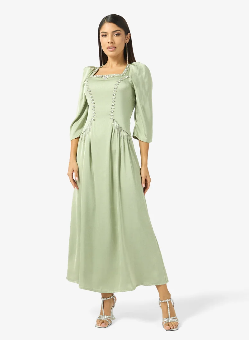 Khizana Embellished Dress With Mock Peplum Detail