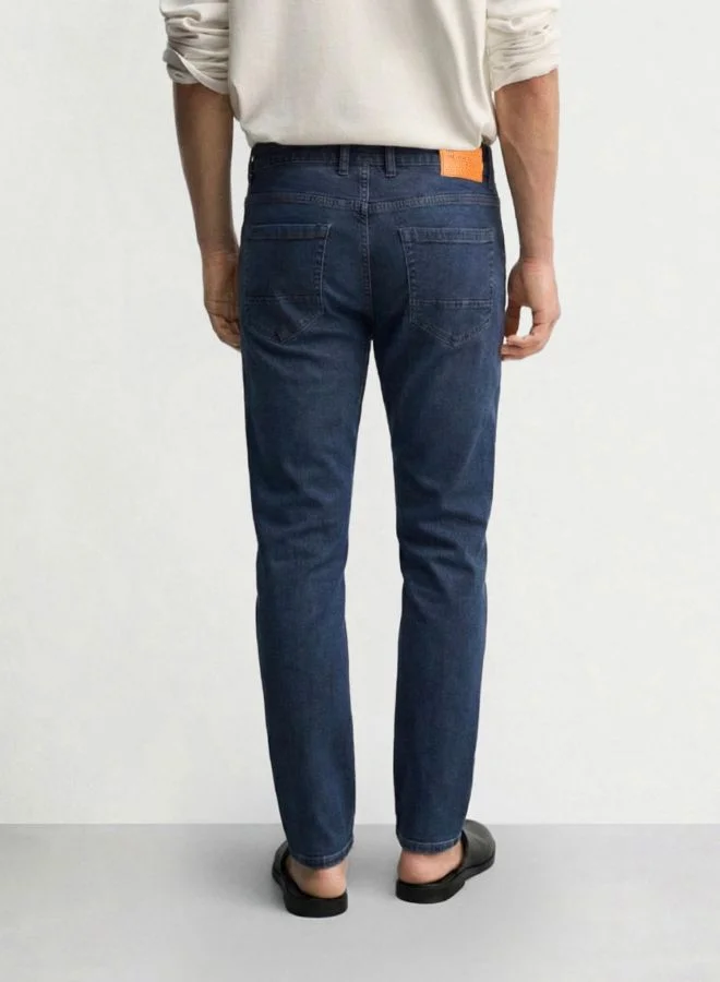 The Indian Garage Co Men Slim Fit Solid Scoop Pocket Mid-Rise Jeans