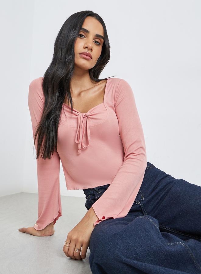 Styli Solid Tie Up Neck Long Sleeve Top - Image 1