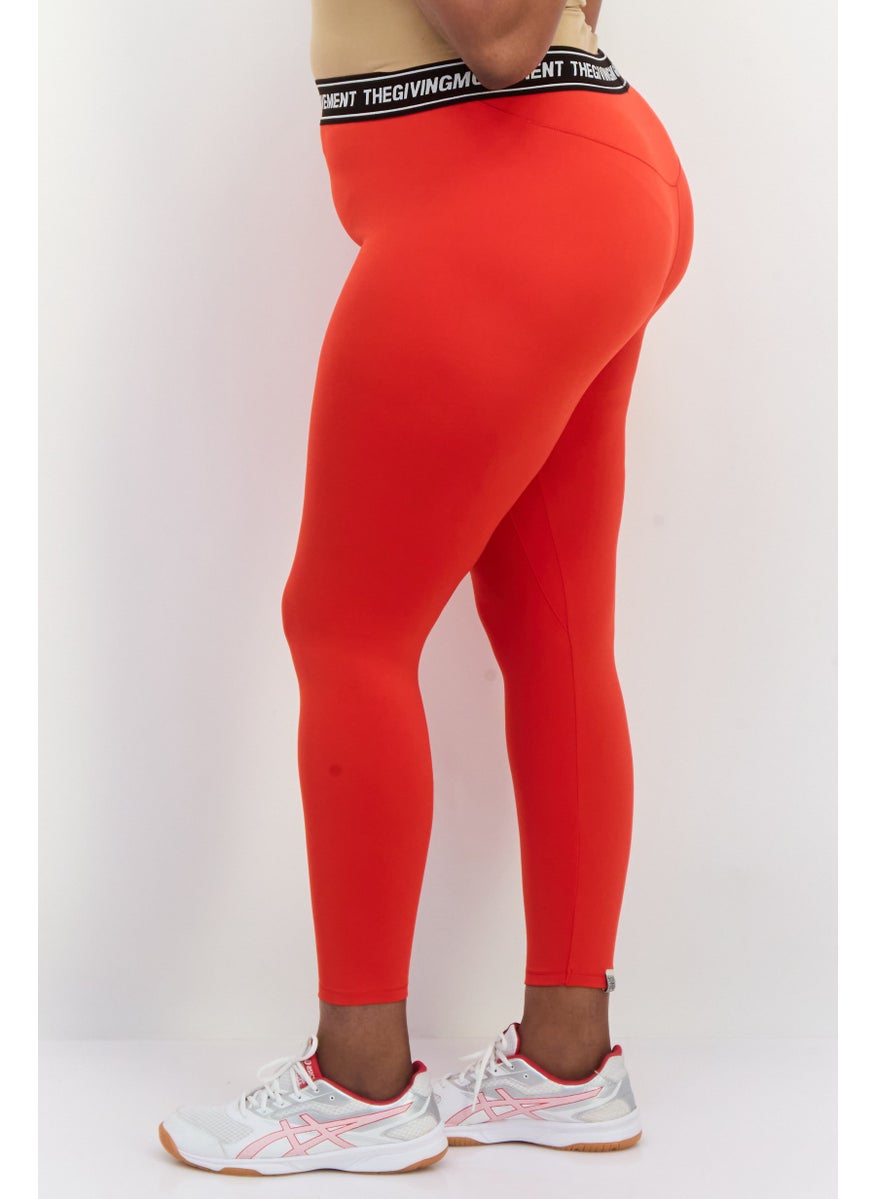 The Giving Movement - Women Brand Logo Plain Leggings, Red - Image 1