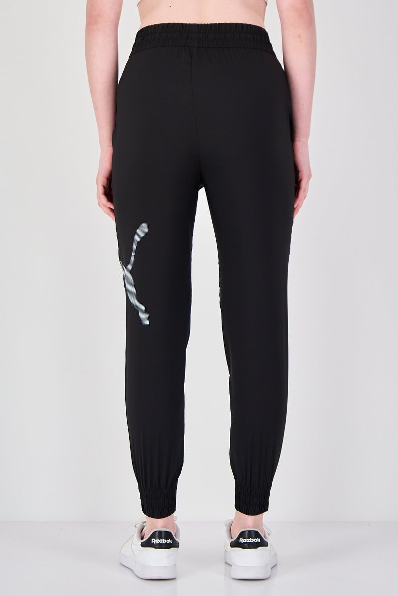 PUMA سروال رياضي نسائي بملاءمة شعار العلامة التجارية، أسود - Image 3