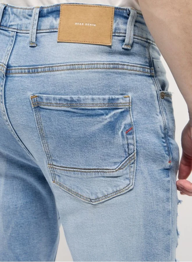 The Bear House  Men's Light Blue with Light Fade Distressed Mid-Rise Slim Fit Jeans Classic Comfort With Modern Style, Perfect For Everyday Casual Looks And Effortless Streetwear Vibes for Men | Best Price UAE