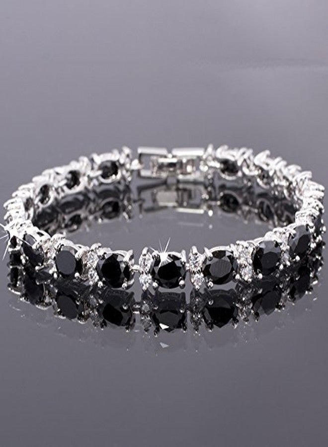 RIZILIA Oval Cut Simulated Black Onyx and White Cubic Zirconia 18K White gold Plated Tennis Bracelet, 7" - Image 3
