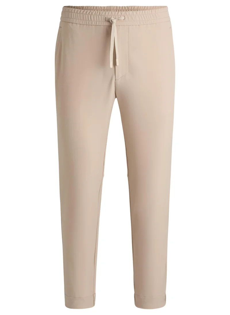 BOSS Tapered-fit trousers in water-repellent stretch fabric