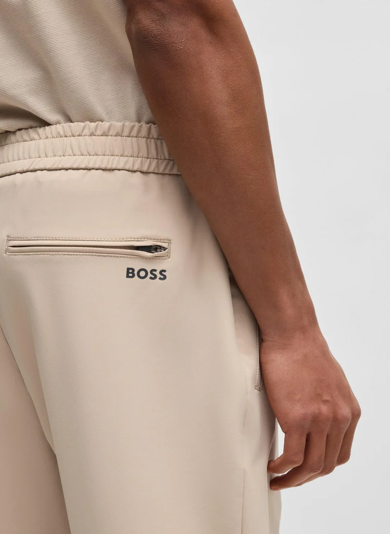 BOSS Tapered-fit trousers in water-repellent stretch fabric