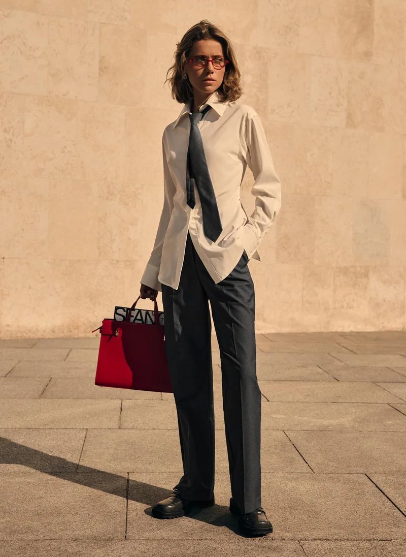 Lichi  Straight cut trousers with pleats and stitched creases for Women | Best Price UAE