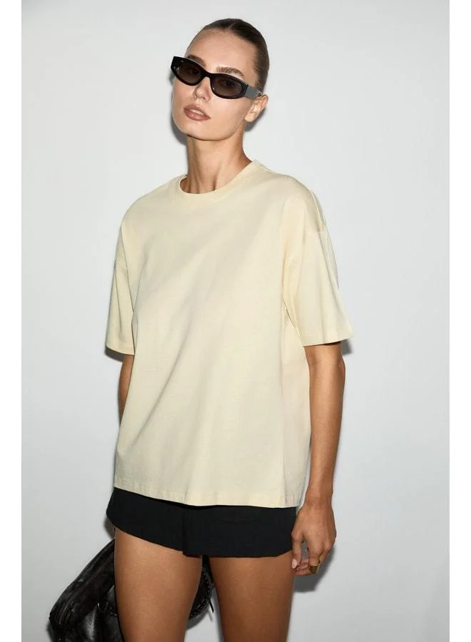 GRIMELANGE LAGERTHA Women's 100% organic cotton thick-textured oversize fit round-neck light yellow T‑shirt.