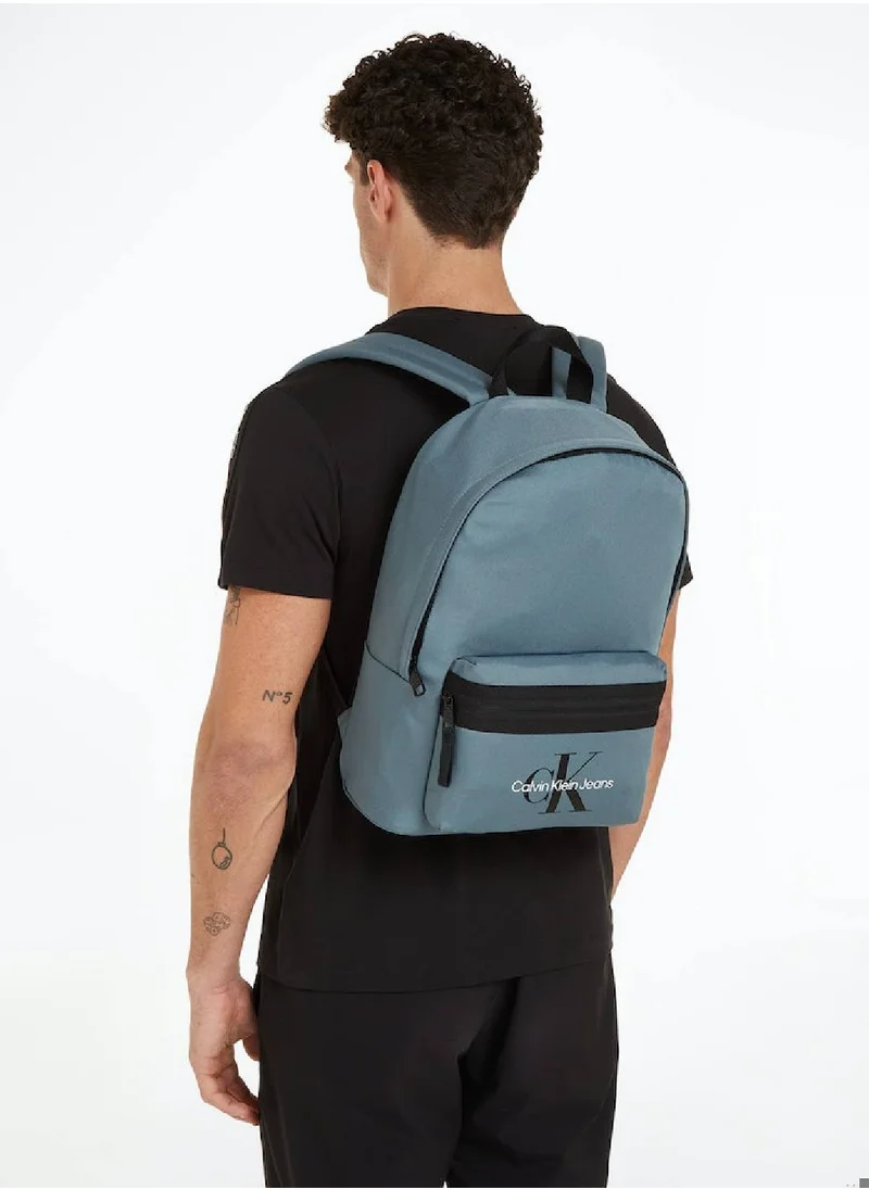 Calvin Klein Jeans Men's Round Backpack -  durable recycled polyester exterior, Blue