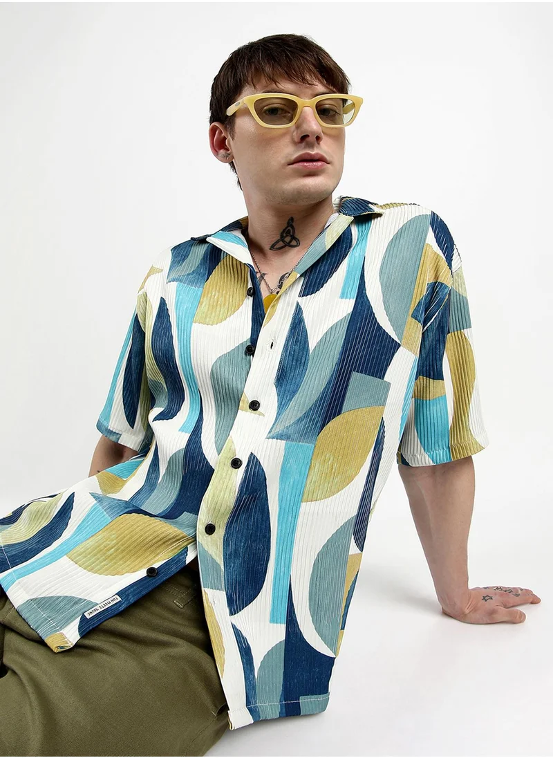 Campus Sutra Campus Sutra Men's Indigo Blue Oversized Abstract Curves Shirt For Casual Wear | Cuban Collar | Short Sleeve | Button Closure | Shirt Crafted With Comfort Fit For Everyday Wear