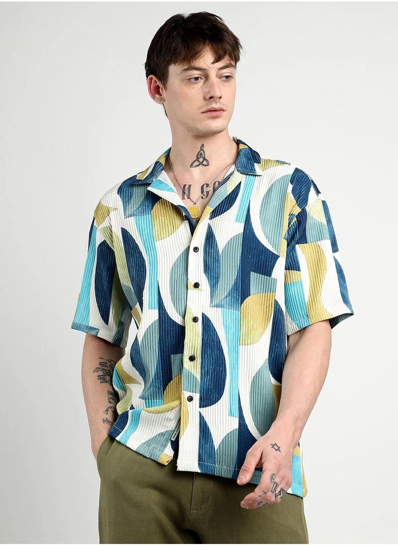 Campus Sutra Campus Sutra Men's Indigo Blue Oversized Abstract Curves Shirt For Casual Wear | Cuban Collar | Short Sleeve | Button Closure | Shirt Crafted With Comfort Fit For Everyday Wear