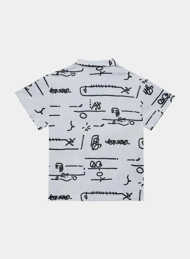 ستايلي Boys White Graphic Print Polo T-Shirt